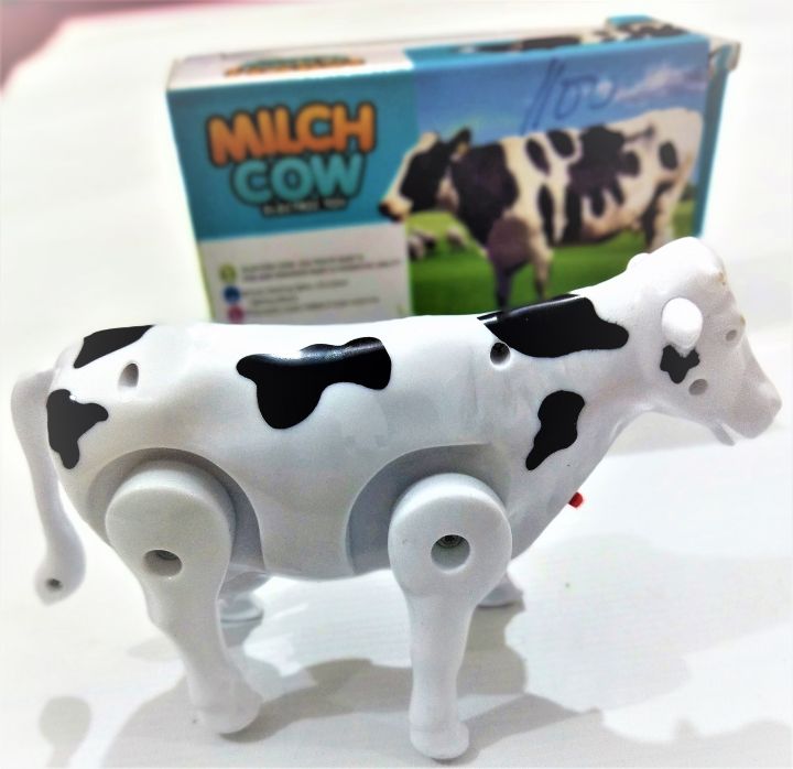 Funny Walking Musical Milch Cow Toy for Kids – Black & White Electric Animal with Lights, Sound & Moving Tail